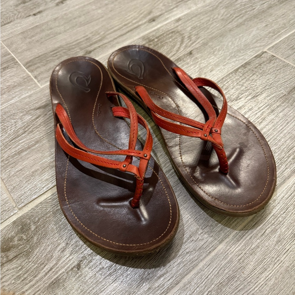 Olukai red leather flip flops
